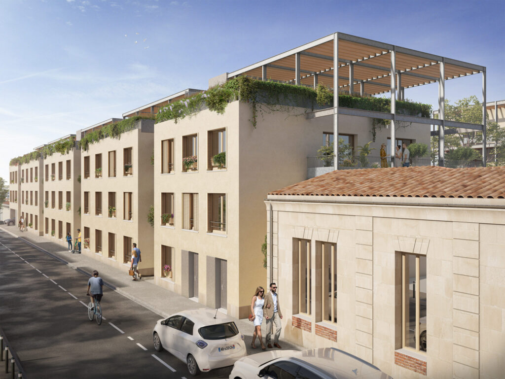 Insertion urbaine de la résidence L'Écrin des Chartons dans une rue de Bordeaux, mêlant façades contemporaines claires, toitures végétalisées et architecture en pierre.