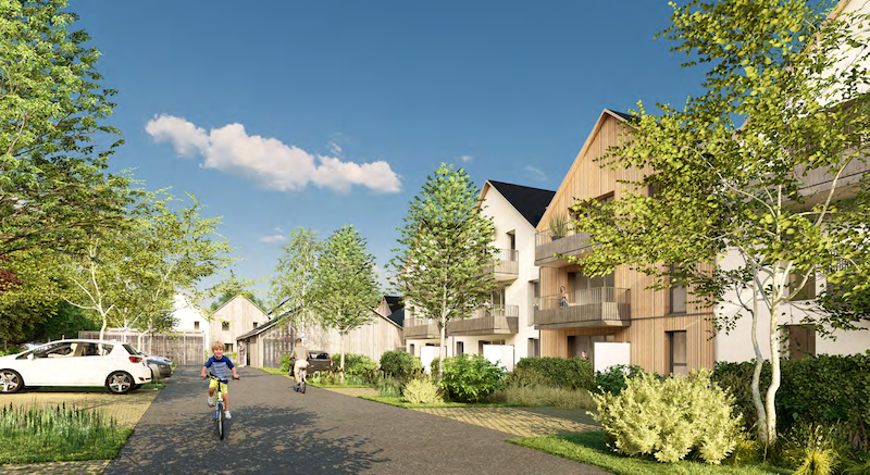 Allée centrale paisible et verdoyante du programme immobilier Les Longères d'Orgemont, montrant des circulations douces, des stationnements arborés et des appartements avec balcons privatifs.